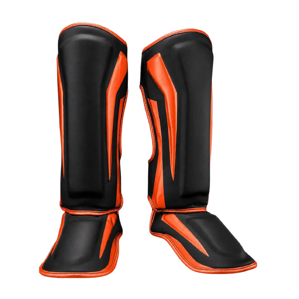 Paire de protège-tibias et pieds noirs avec panneaux orange en forme de flammes et bordure orange